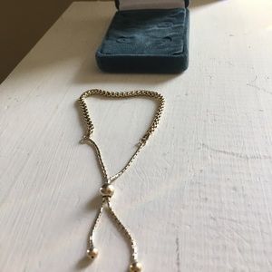 The Bradford Exchange gold bracelet.